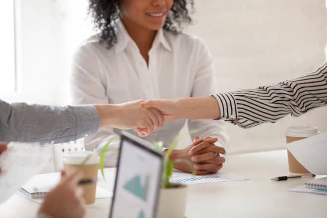 two people shaking hands