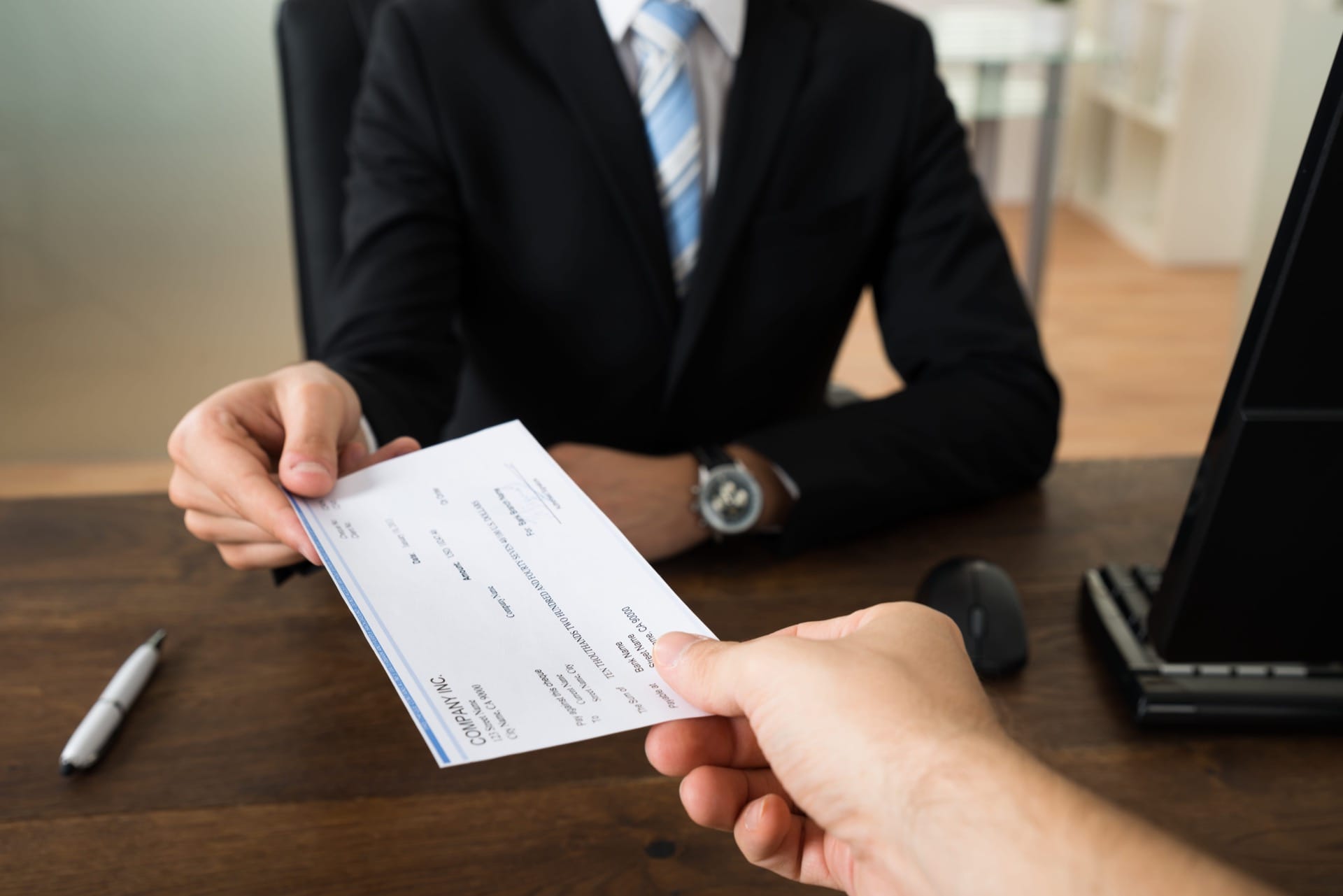 Insurance company handing out insurance money
